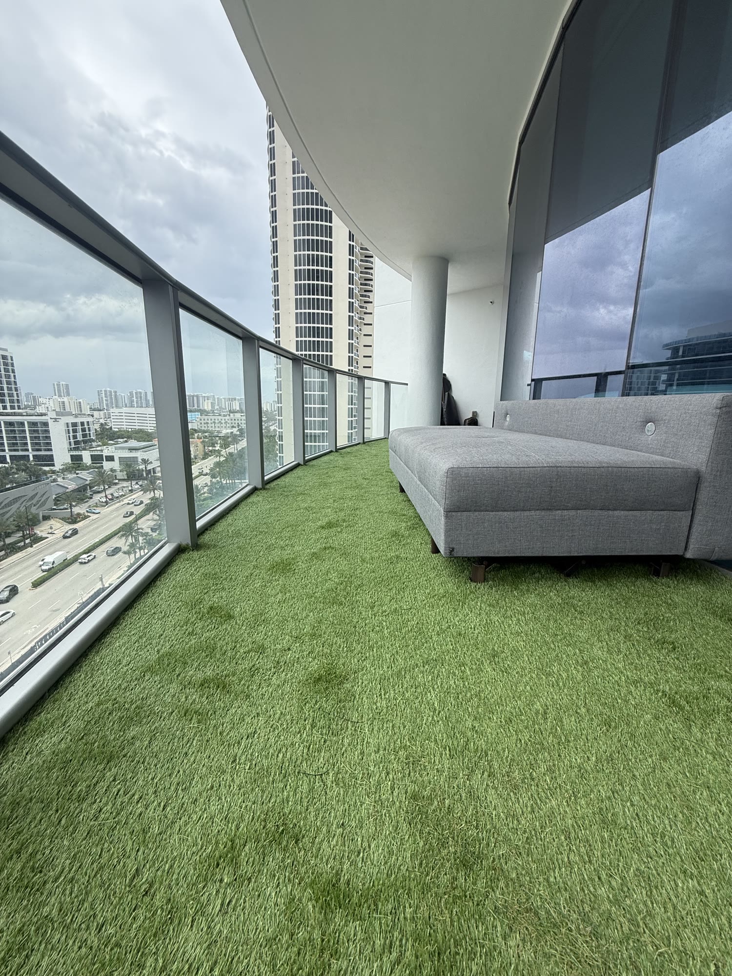 Artificial turf installed on a high-rise residential balcony